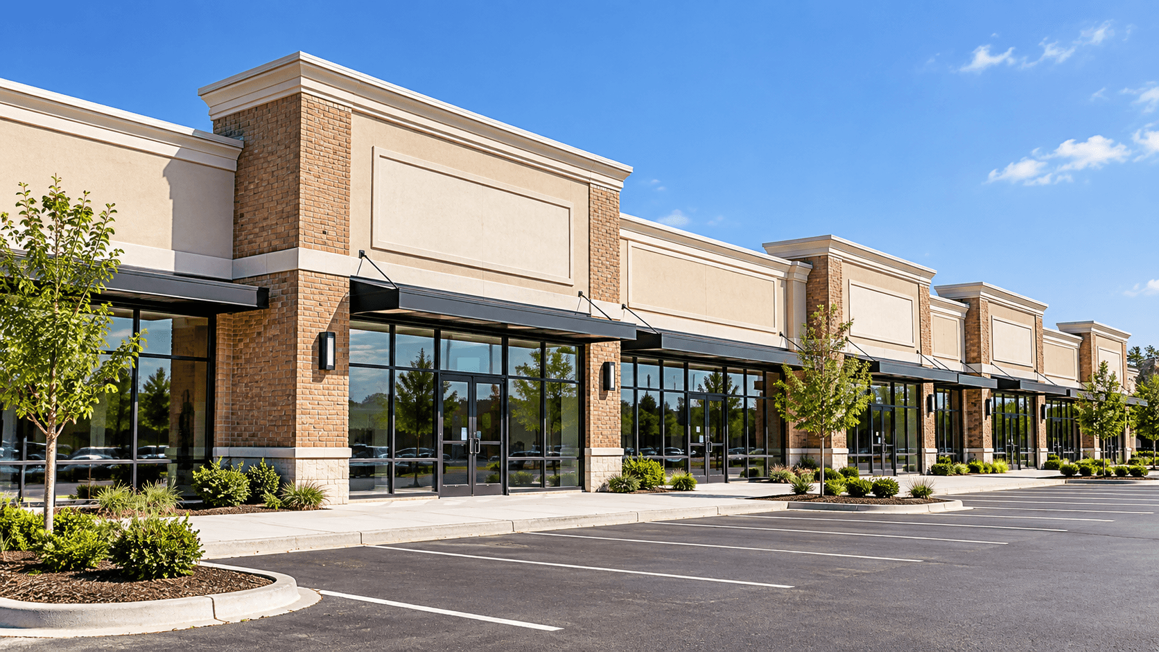 A row of coordinated retail storefronts at a shopping center